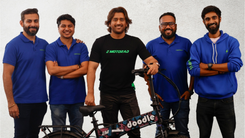 MS Dhoni with EMotorad Team