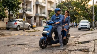 Ather Rizta electric scooter carrying two riders comfortably on an Indian residential road during a real-world ride test.