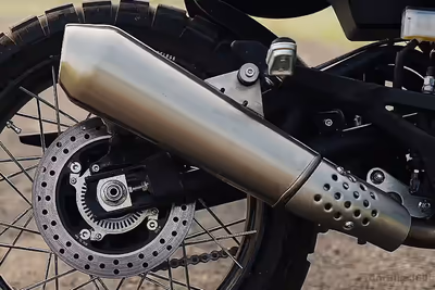 Sleek, Upswept Stainless Steel Silencer - The Sound of Unrestricted Adventure