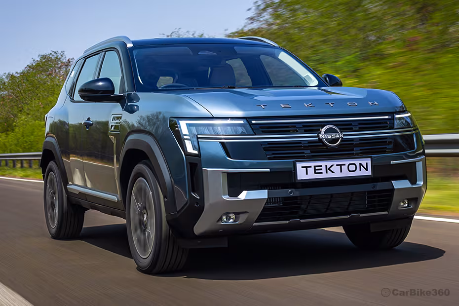 Nissan Tekton Moonbow-Grey SUV Driving Front Right Side Exterior View