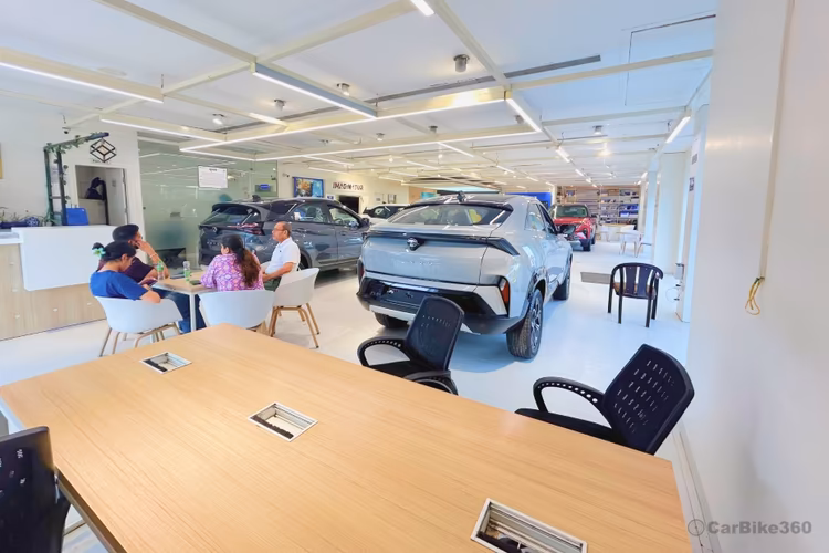 Arya Motors - Golf Course Interior customer sales lounge area view Arya Motors - Golf Course Interior customer sales lounge area view