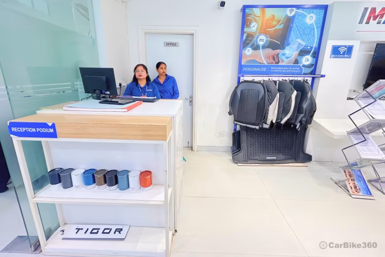 Arya Motors - Golf Course Interior Reception Podium view Arya Motors - Golf Course Interior Reception Podium view