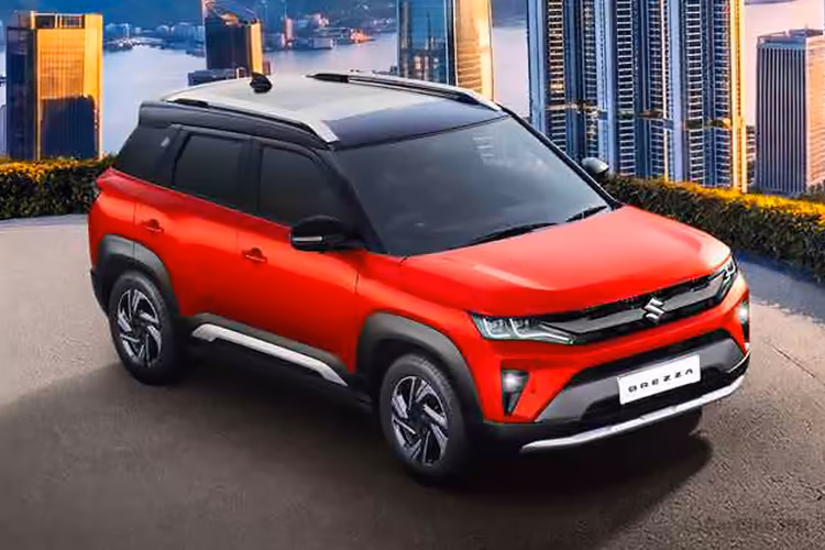 Maruti Suzuki Brezza Sizzling Red With Bluish Black Roof SUV Right Front Side Exterior View Maruti Suzuki Brezza Sizzling Red With Bluish Black Roof SUV Right Front Side Exterior View