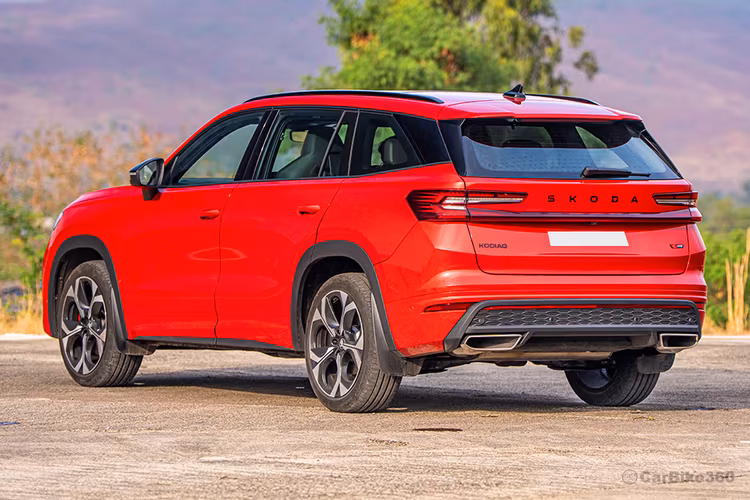 Skoda Kodiaq RS Velvet Red SUV Left rear side view showing tailgate